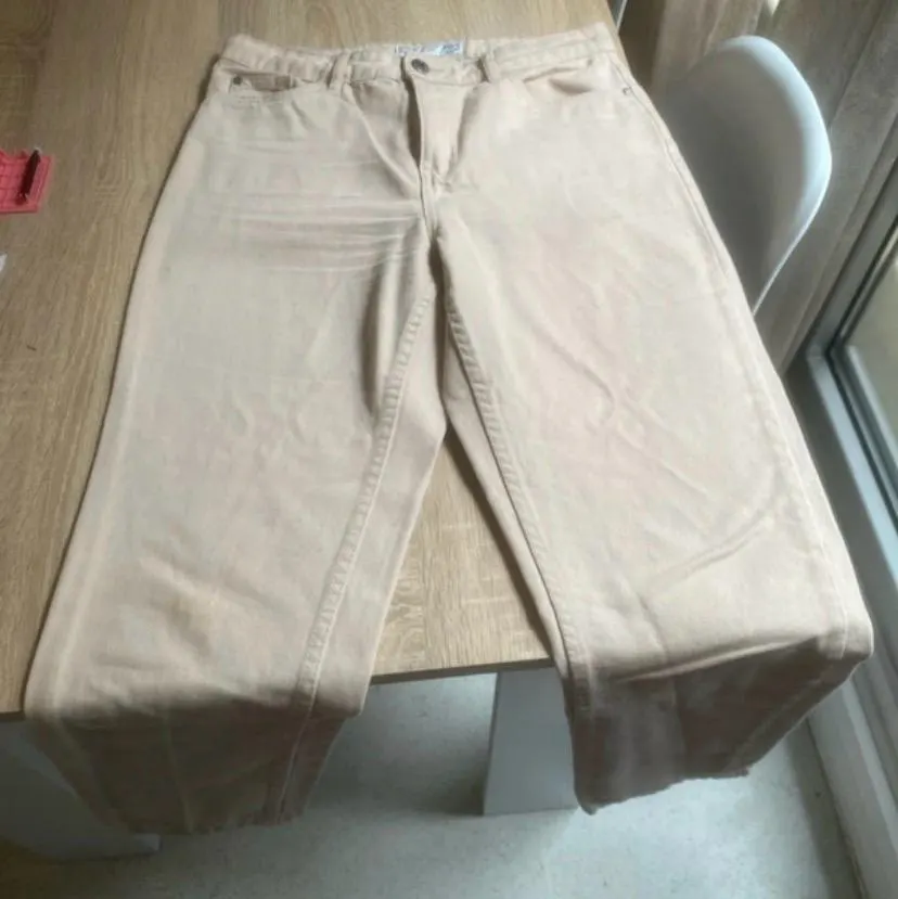Vaquero beige de corte regular